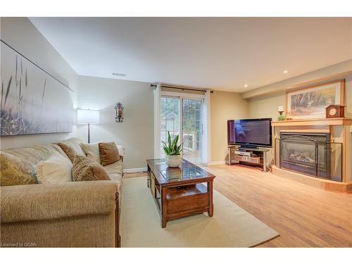 631 Holman Crescent, Fergus, ON - Indoor Photo Showing Living Room With Fireplace