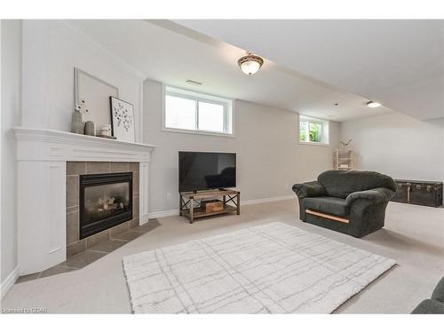 115 Andrews Dr W, Drayton, ON - Indoor With Fireplace