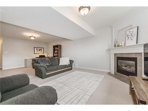 115 Andrews Dr W, Drayton, ON - Indoor Photo Showing Living Room With Fireplace