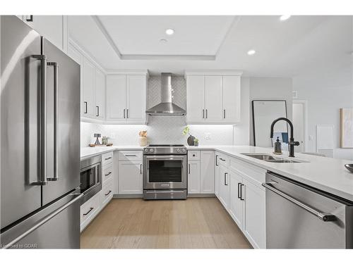 411-71 Wyndham Street S, Guelph, ON - Indoor Photo Showing Kitchen With Stainless Steel Kitchen With Double Sink With Upgraded Kitchen