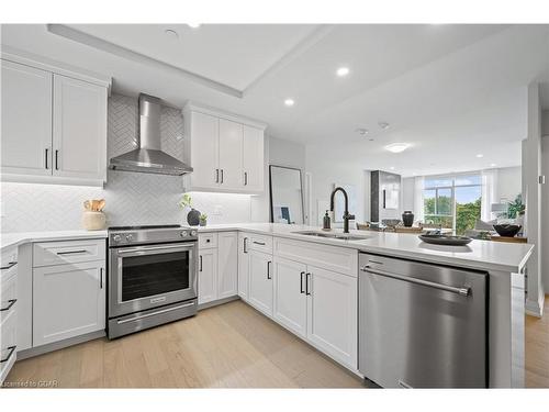 411-71 Wyndham Street S, Guelph, ON - Indoor Photo Showing Kitchen With Stainless Steel Kitchen With Double Sink With Upgraded Kitchen