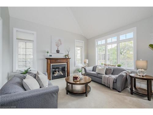 35-875 University Avenue E, Waterloo, ON - Indoor Photo Showing Living Room With Fireplace