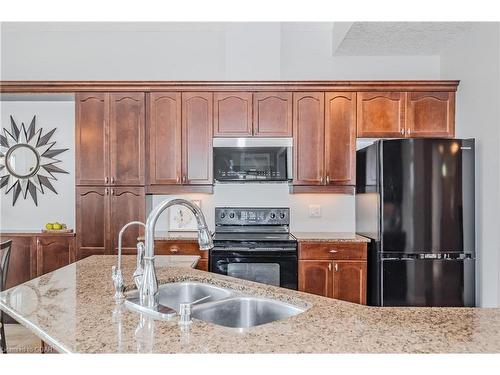 35-875 University Avenue E, Waterloo, ON - Indoor Photo Showing Kitchen With Double Sink