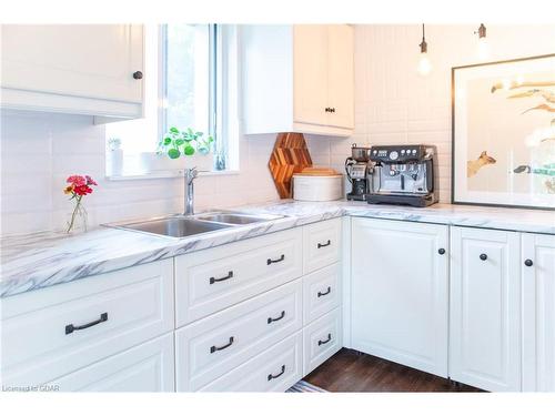 504-358 Waterloo Avenue, Guelph, ON - Indoor Photo Showing Kitchen With Double Sink