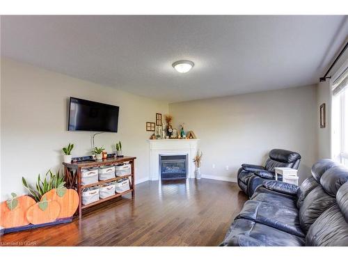 132 Schmidt Drive, Arthur, ON - Indoor Photo Showing Living Room With Fireplace