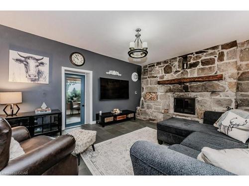 8292 Wilson Street, Guelph/Eramosa, ON - Indoor Photo Showing Living Room With Fireplace