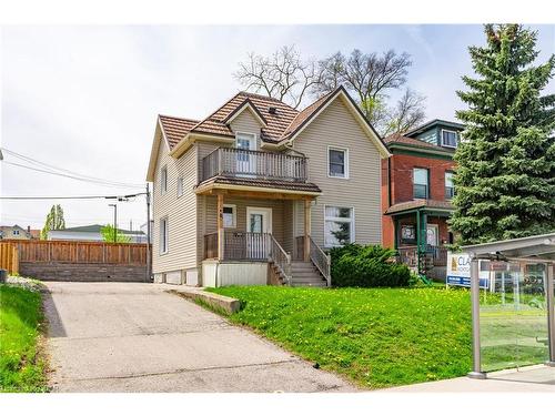 15 Charles Street E, Kitchener, ON - Outdoor With Balcony With Facade