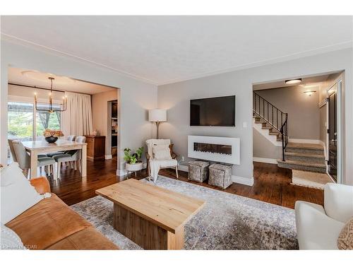 4 Canary Court, Elmira, ON - Indoor Photo Showing Living Room With Fireplace