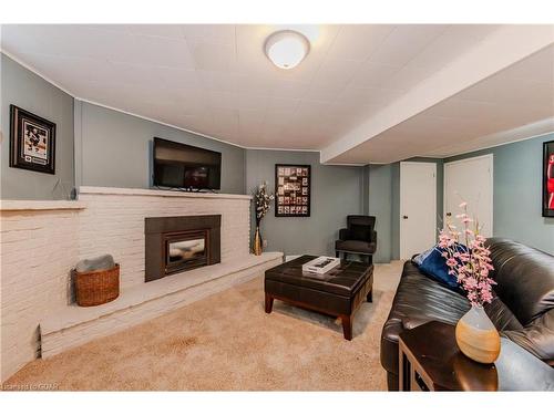 4 Canary Court, Elmira, ON - Indoor Photo Showing Living Room With Fireplace