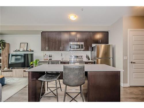 304-1105 Leger Way, Milton, ON - Indoor Photo Showing Kitchen With Stainless Steel Kitchen