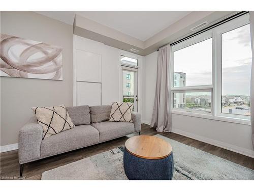 304-1105 Leger Way, Milton, ON - Indoor Photo Showing Living Room