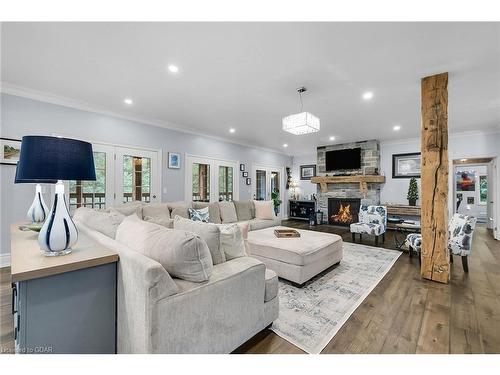 7 Fox Run Drive, Puslinch, ON - Indoor Photo Showing Living Room With Fireplace