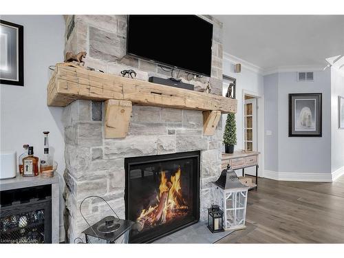 7 Fox Run Drive, Puslinch, ON - Indoor Photo Showing Living Room With Fireplace