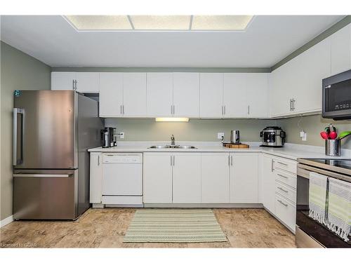 202-105 Bagot Street, Guelph, ON - Indoor Photo Showing Kitchen With Double Sink