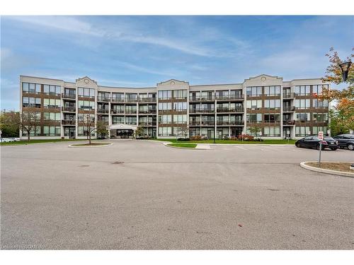 202-105 Bagot Street, Guelph, ON - Outdoor With Balcony With Facade