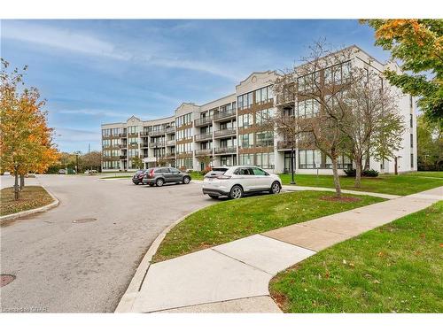 202-105 Bagot Street, Guelph, ON - Outdoor With Facade