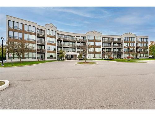 202-105 Bagot Street, Guelph, ON - Outdoor With Balcony With Facade