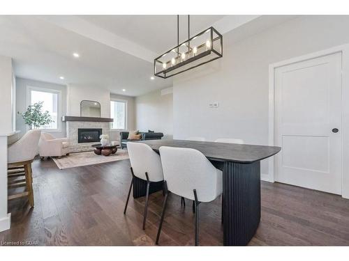 157 Jack'S Way, Mount Forest, ON - Indoor Photo Showing Dining Room With Fireplace