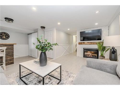 16 Nickolas Crescent, Cambridge, ON - Indoor Photo Showing Living Room With Fireplace