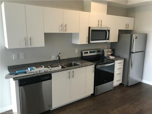 403-35 Kingsbury Square, Guelph, ON - Indoor Photo Showing Kitchen With Double Sink