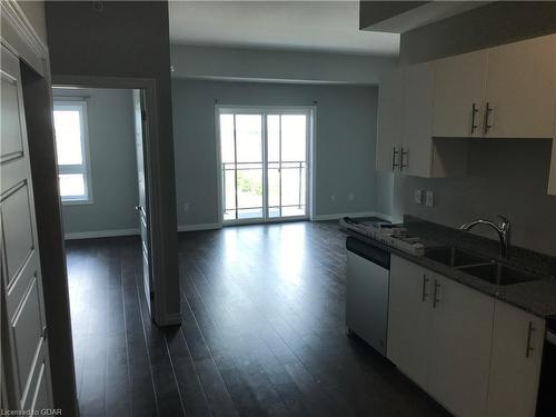 403-35 Kingsbury Square, Guelph, ON - Indoor Photo Showing Kitchen With Double Sink