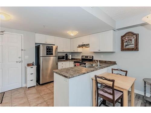 201-60 Lynnmore Street, Guelph, ON - Indoor Photo Showing Kitchen With Double Sink