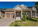 116 Harpin Way E, Fergus, ON  - Outdoor With Deck Patio Veranda With Facade 