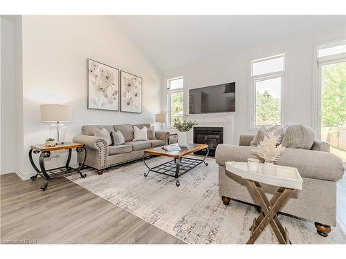 116 Harpin Way E, Fergus, ON - Indoor Photo Showing Living Room With Fireplace