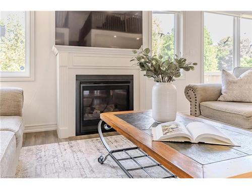 116 Harpin Way E, Fergus, ON - Indoor Photo Showing Living Room With Fireplace