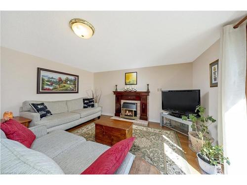 119 Lou'S Boulevard, Rockwood, ON - Indoor Photo Showing Living Room With Fireplace