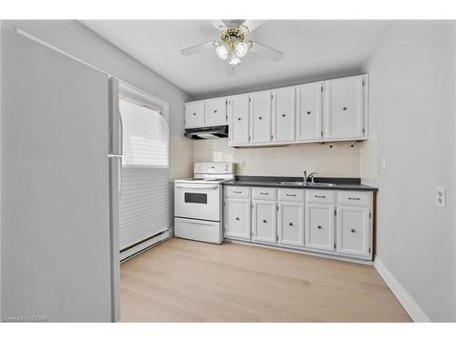 165-2050 Upper Middle Road, Burlington, ON - Indoor Photo Showing Kitchen With Double Sink