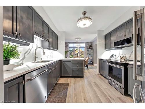 108-71 Bayberry Drive, Guelph, ON - Indoor Photo Showing Kitchen With Stainless Steel Kitchen With Double Sink With Upgraded Kitchen