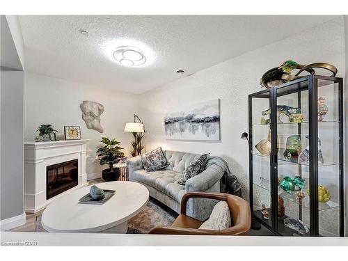 108-71 Bayberry Drive, Guelph, ON - Indoor Photo Showing Living Room With Fireplace