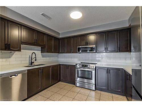 202-904 Paisley Road, Guelph, ON - Indoor Photo Showing Kitchen With Stainless Steel Kitchen