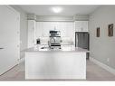 103-73 Arthur Street S, Guelph, ON  - Indoor Photo Showing Kitchen With Double Sink 