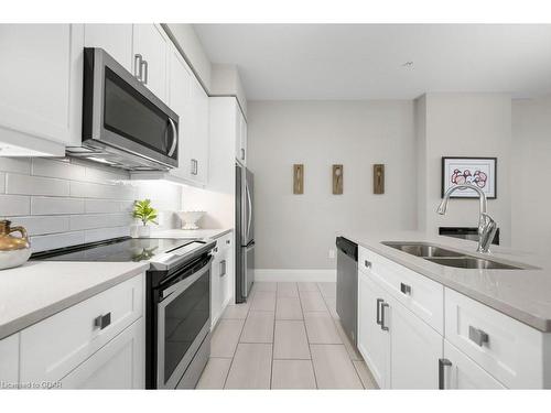 103-73 Arthur Street S, Guelph, ON - Indoor Photo Showing Kitchen With Double Sink