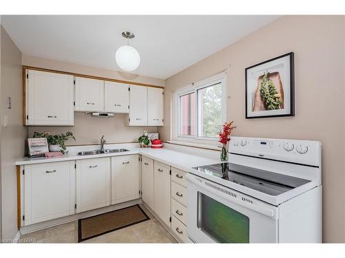 5-2 Worton Avenue, Wellington, ON - Indoor Photo Showing Kitchen With Double Sink