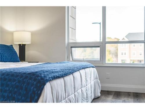 102-399 Queen Street S, Kitchener, ON - Indoor Photo Showing Bedroom