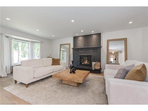 24 Bridlewood Drive, Guelph, ON - Indoor Photo Showing Living Room With Fireplace