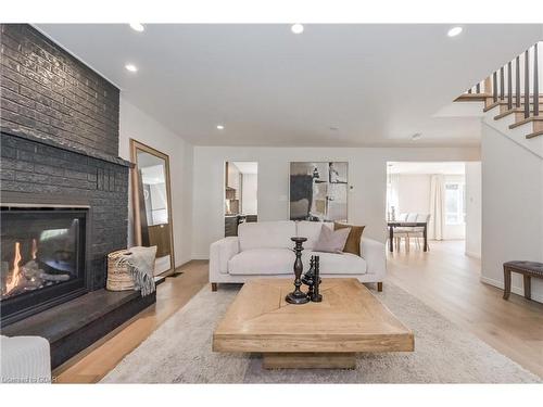 24 Bridlewood Drive, Guelph, ON - Indoor Photo Showing Living Room With Fireplace