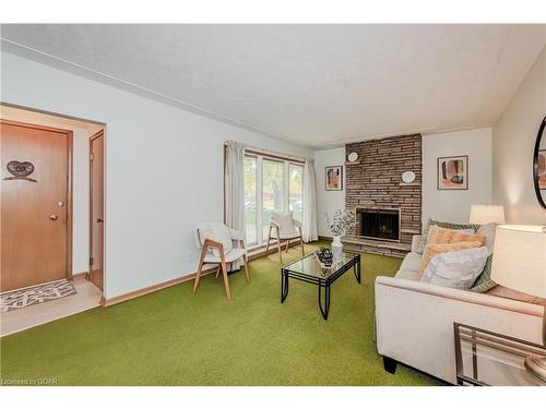 10 Pine Drive, Guelph, ON - Indoor Photo Showing Living Room With Fireplace