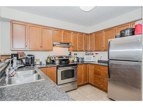 51-167 Arkell Road, Guelph, ON - Indoor Photo Showing Kitchen With Double Sink