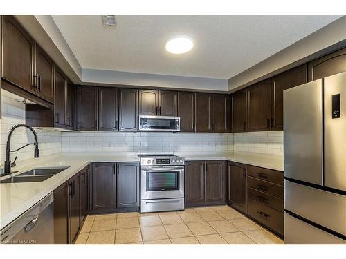 202-904 Paisley Road, Guelph, ON - Indoor Photo Showing Kitchen With Stainless Steel Kitchen With Double Sink With Upgraded Kitchen