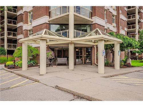 401-8 Christopher Court, Guelph, ON - Outdoor With Balcony With Facade