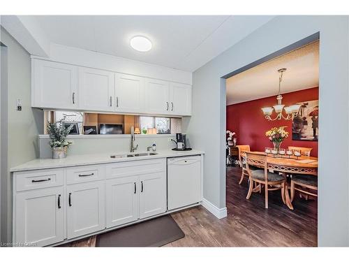 401-8 Christopher Court, Guelph, ON - Indoor Photo Showing Kitchen With Double Sink