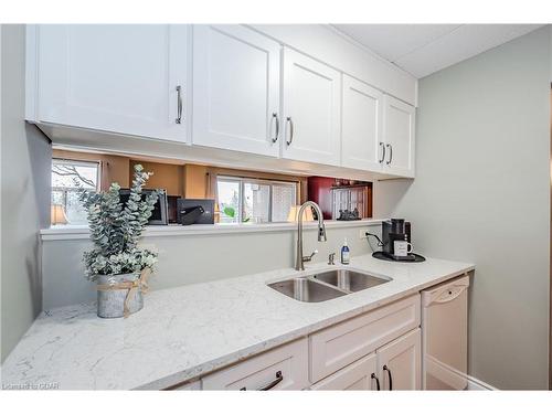 401-8 Christopher Court, Guelph, ON - Indoor Photo Showing Kitchen With Double Sink