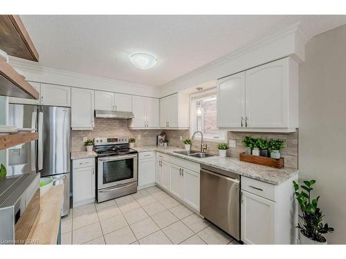 17 Hasler Crescent, Guelph, ON - Indoor Photo Showing Kitchen With Double Sink