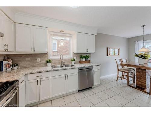 17 Hasler Crescent, Guelph, ON - Indoor Photo Showing Kitchen With Double Sink