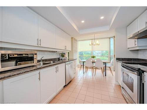 406-55 Kingsbridge Garden Circle, Mississauga, ON - Indoor Photo Showing Kitchen With Double Sink