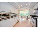 406-55 Kingsbridge Garden Circle, Mississauga, ON  - Indoor Photo Showing Kitchen With Double Sink 